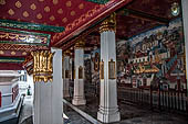 Bangkok Grand Palace, the 'Ramakien' gallery of the Wat Phra Kaew. The pictures are accompanied by verses engraved on marble slabs embedded in the columns surrounding the gallery.  